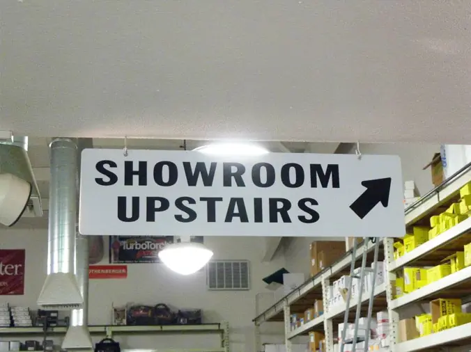 Showroom Upstairs sign at Heieck Supply