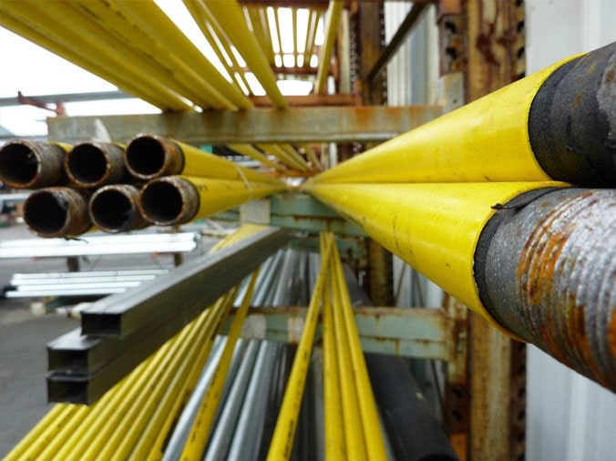 Yellow steel plumbing pipes at Heieck Wholesale Supply